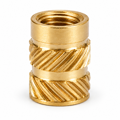 Brass heat-set threaded insert on white background