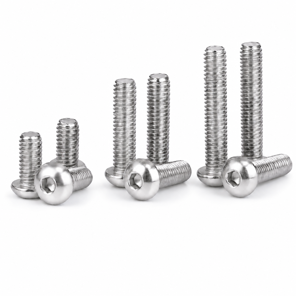 Stainless steel button-head socket screws on white background